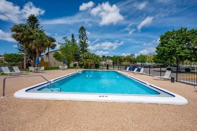 a view of outdoor space and swimming pool