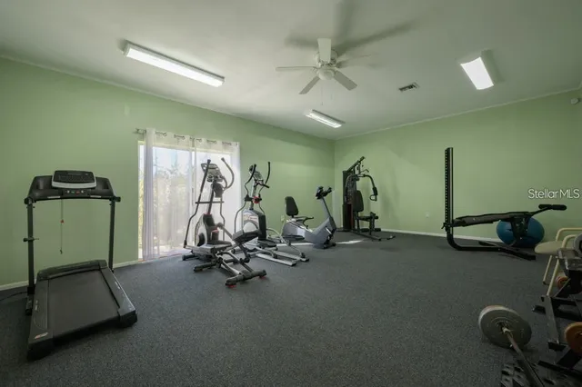 a view of a room with gym equipment