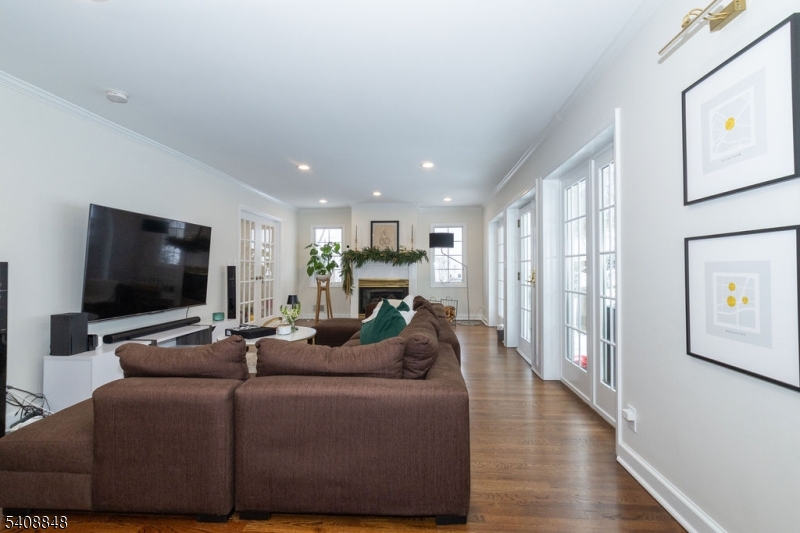 717 Fairmount Avenue Chatham, NJ 07928 - Photo 15 of 35 a living room with furniture and a flat screen tv