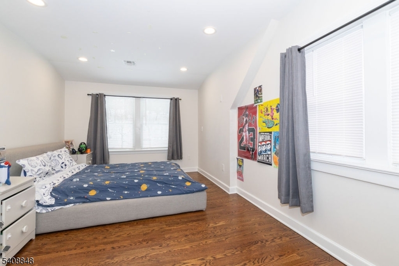 717 Fairmount Avenue Chatham, NJ 07928 - Photo 24 of 35 a bedroom with a bed and window