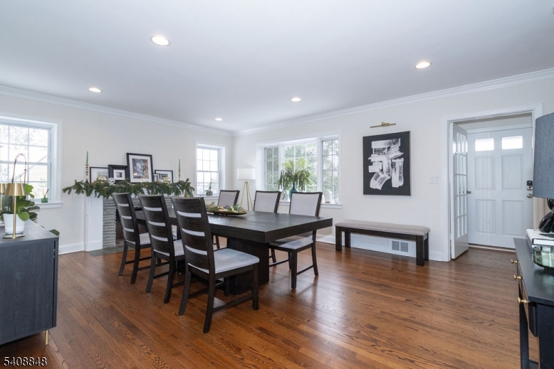 717 Fairmount Avenue Chatham, NJ 07928 - Photo 7 of 35 a view of a dining room with furniture and wooden floor