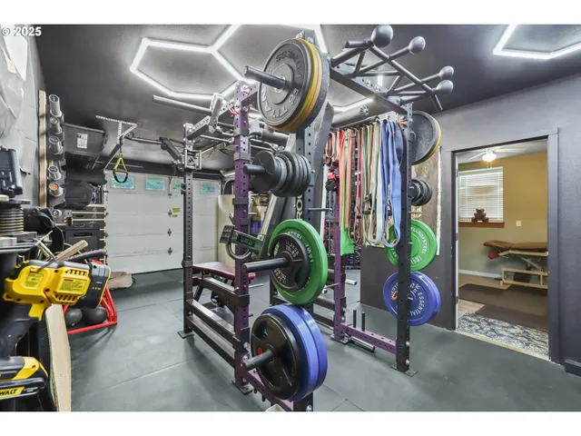 a view of living room with gym equipment
