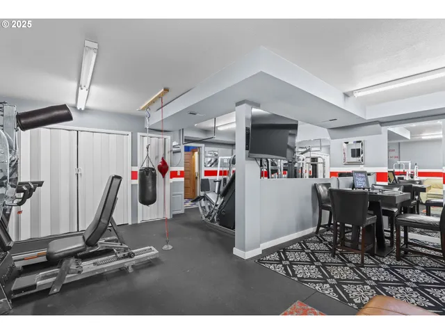 a view of a couches and dinning room with furniture