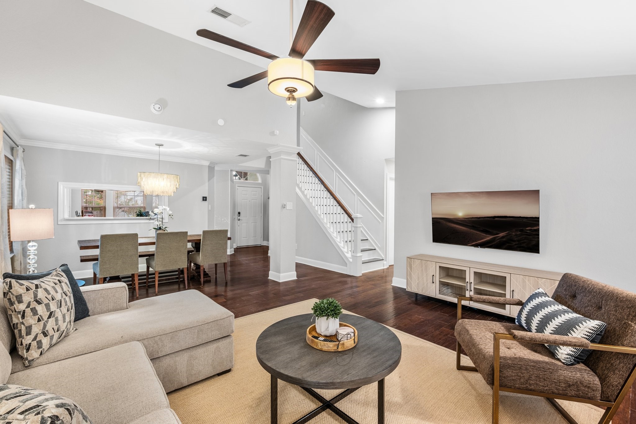7601 Dallas Drive Austin, TX 78729 - Photo 7 of 20 a living room with furniture and a flat screen tv