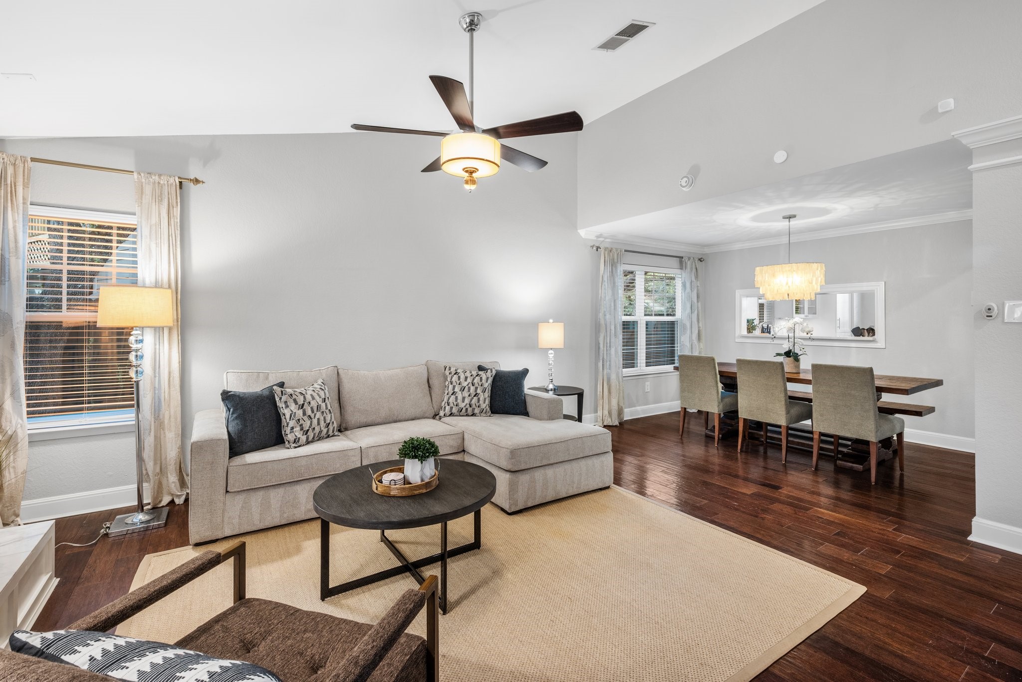 7601 Dallas Drive Austin, TX 78729 - Photo 10 of 20 a living room with furniture and a table