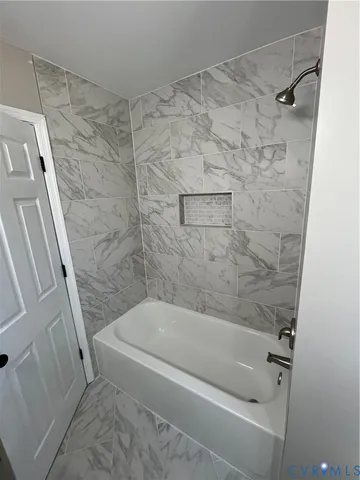 a bathroom with a bathtub