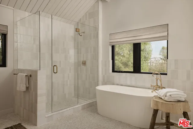 a bathroom with a sink and a bathtub