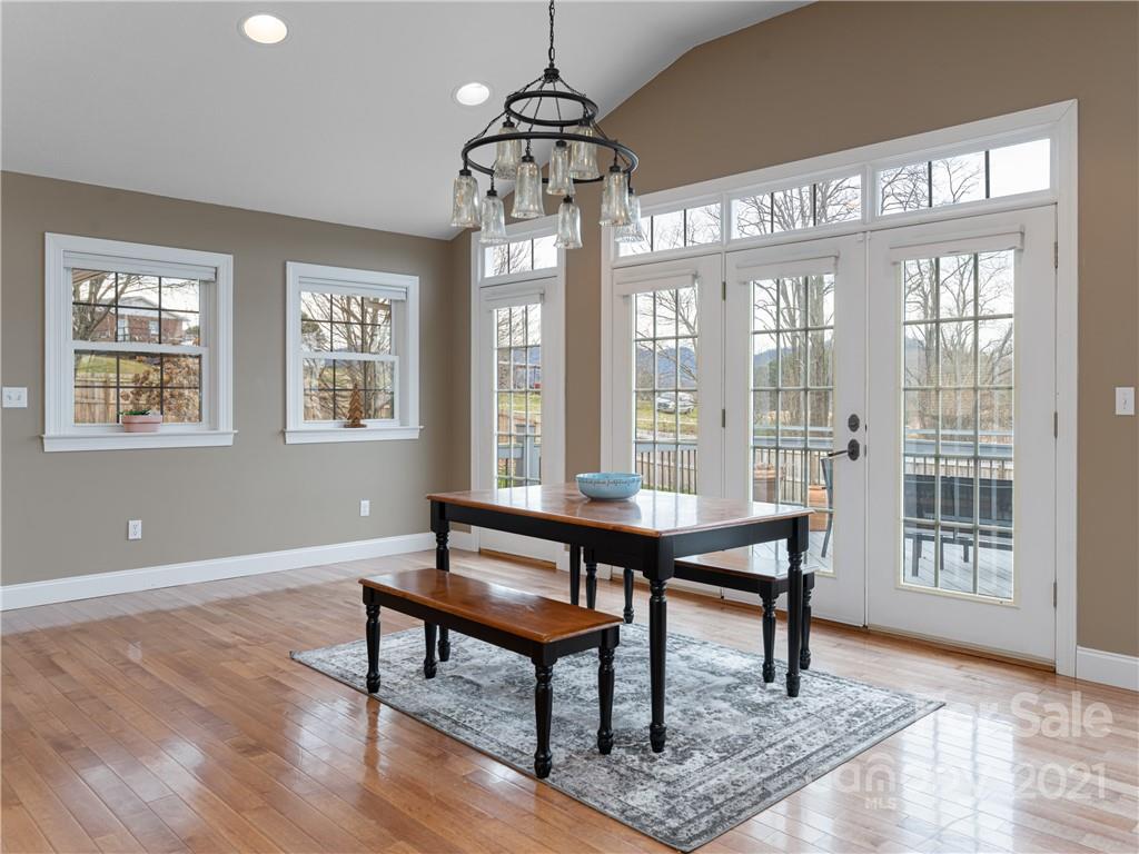 333 Gouges Branch Road Leicester, NC 28748 - Photo 14 of 48 a view of a livingroom with furniture window and wooden floor