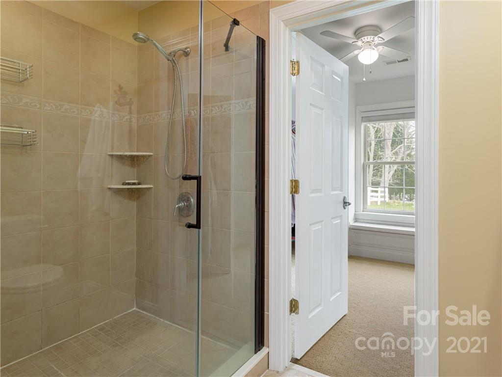 333 Gouges Branch Road Leicester, NC 28748 - Photo 29 of 48 a bathroom with a shower