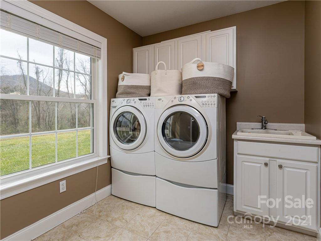 333 Gouges Branch Road Leicester, NC 28748 - Photo 35 of 48 a utility room with dryer and washer