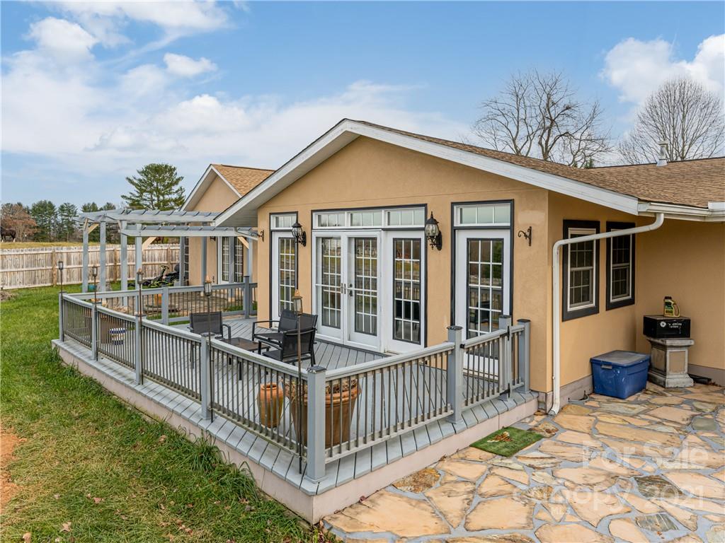 333 Gouges Branch Road Leicester, NC 28748 - Photo 42 of 48 a view of a house with a wooden deck