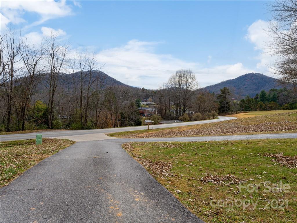 333 Gouges Branch Road Leicester, NC 28748 - Photo 46 of 48 a view of a terrace with a yard