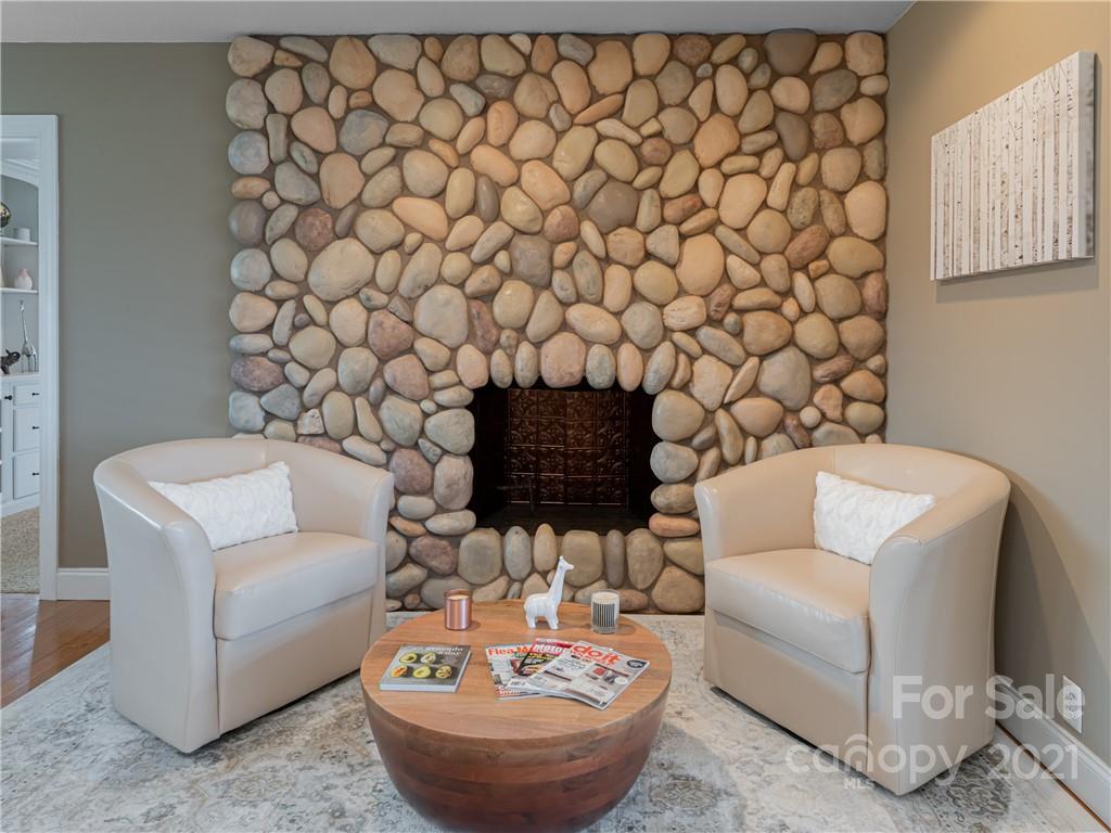 333 Gouges Branch Road Leicester, NC 28748 - Photo 7 of 48 a living room with furniture and a lamp