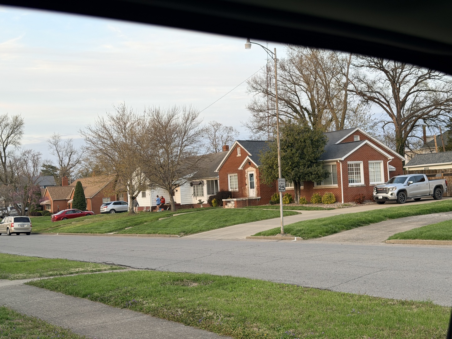 101 5th Street Carmi, IL 62821 - Photo 27 of 28 a house with trees in the background