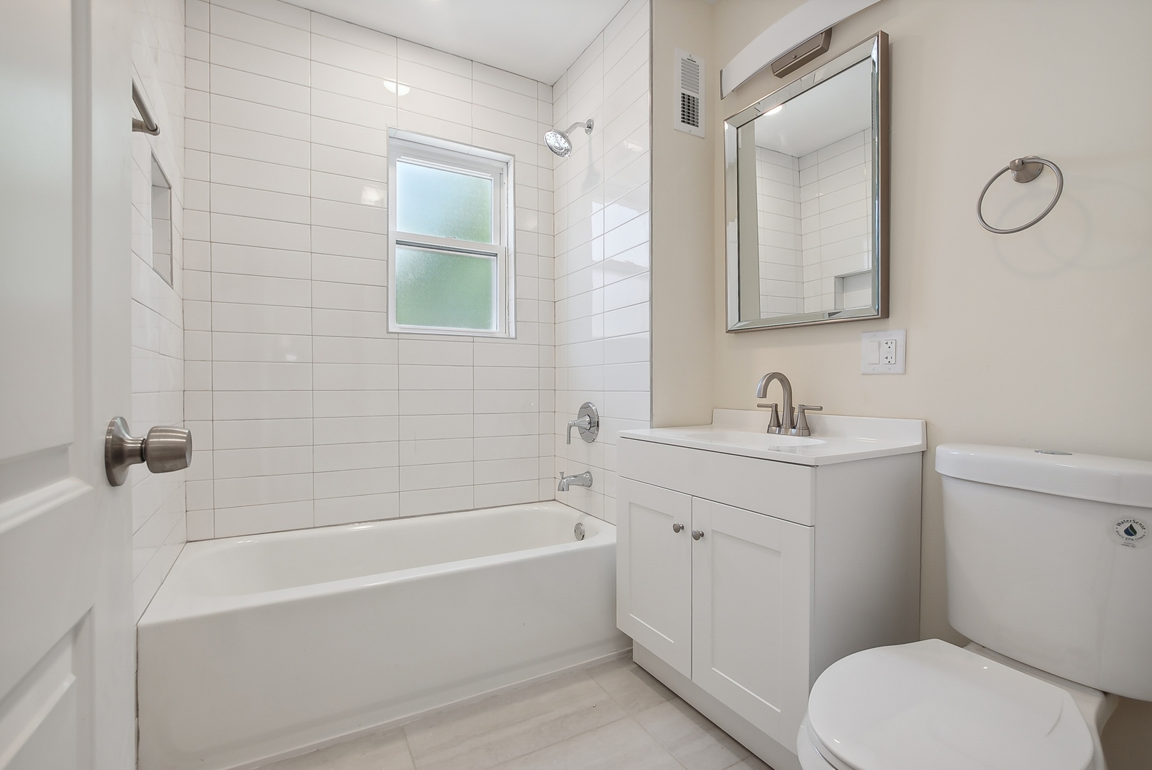 8325 South Perry Avenue Chicago, IL 60620 - Photo 10 of 15 a bathroom with a sink a toilet and shower