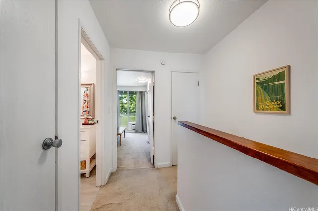 a view of a hallway with entryway