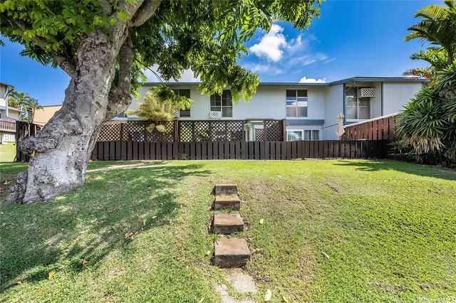 a garden view with a seating space