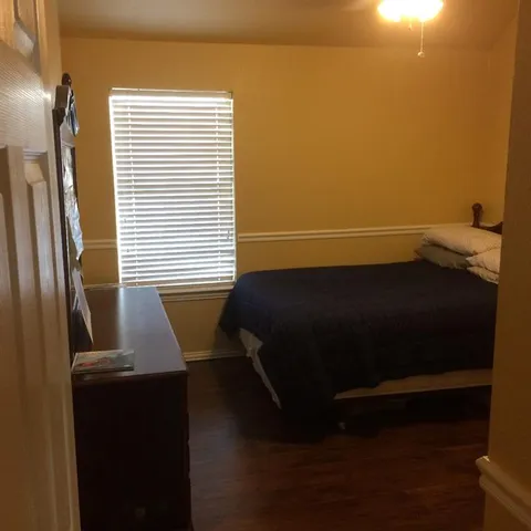 a bathroom with a sink and a window