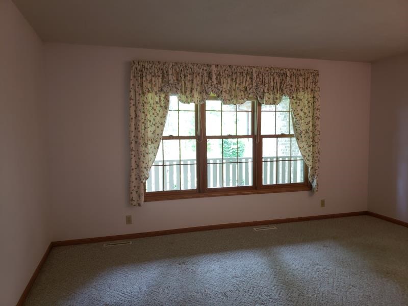 17347 Stimes Road Capron, IL 61012 - Photo 6 of 25 an empty room with a window