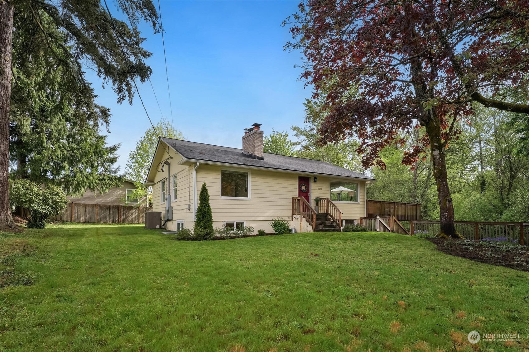 2232 South 330th Street Federal Way, WA 98003 - Photo 1 of 39 a view of a house with a yard