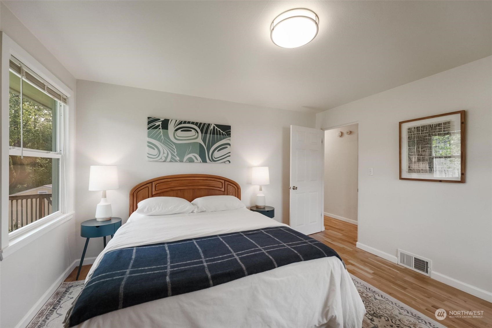 2232 South 330th Street Federal Way, WA 98003 - Photo 17 of 39 a bedroom with a large bed and a window