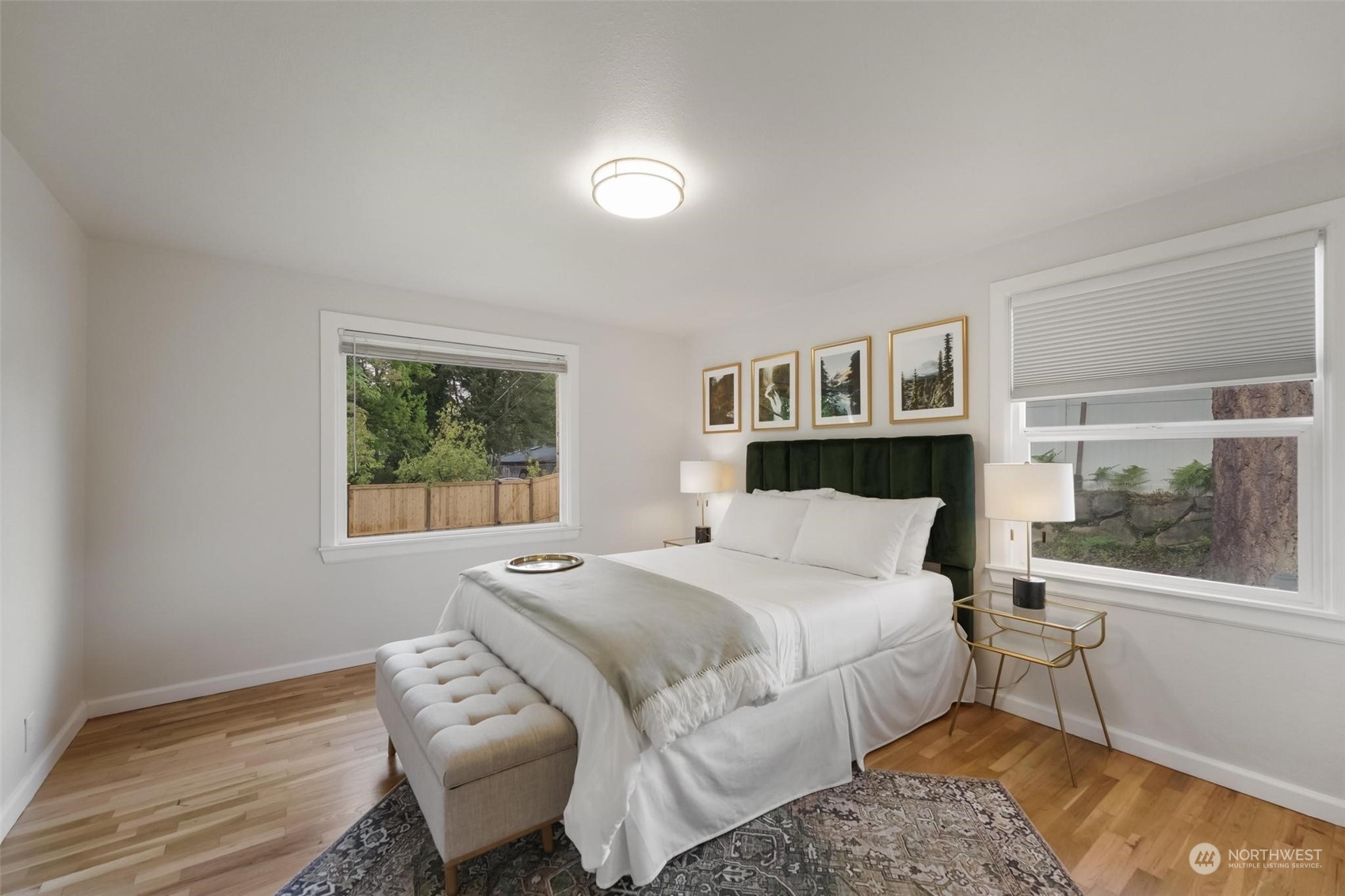 2232 South 330th Street Federal Way, WA 98003 - Photo 18 of 39 a bedroom with a bed and wooden floor