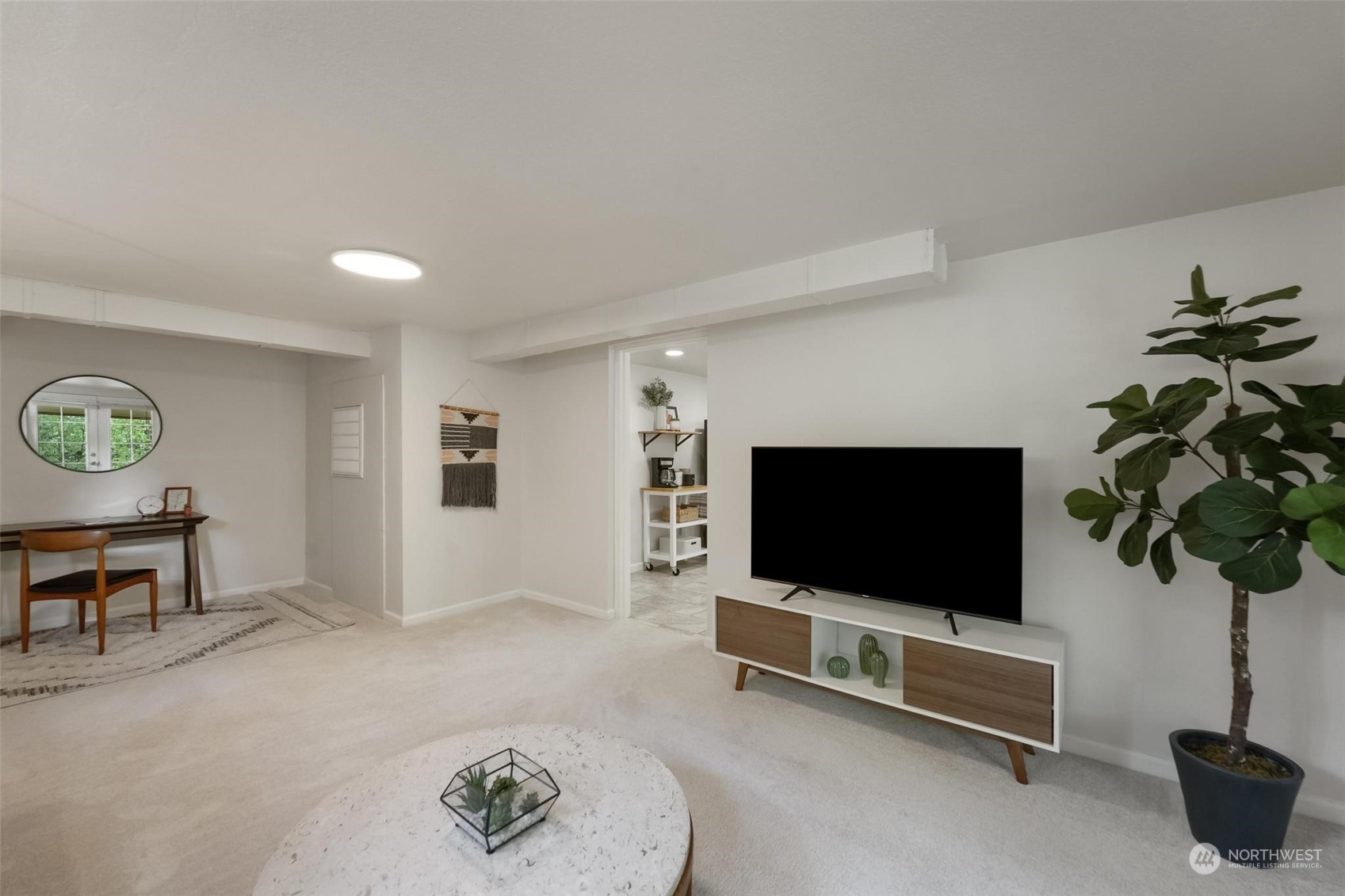 2232 South 330th Street Federal Way, WA 98003 - Photo 27 of 39 a living room with furniture and a flat screen tv