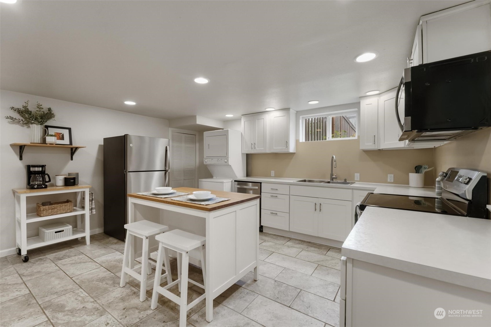 2232 South 330th Street Federal Way, WA 98003 - Photo 28 of 39 a kitchen with a stove a sink and a refrigerator