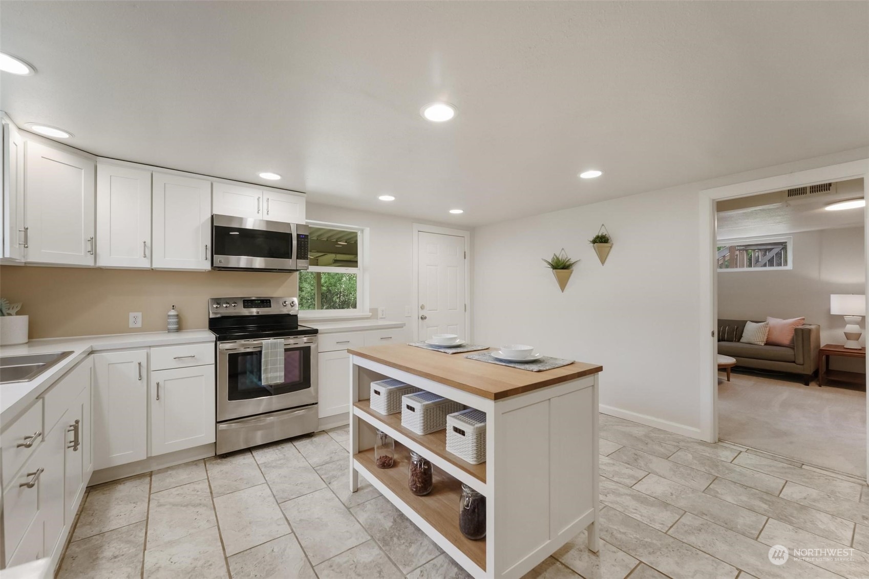 2232 South 330th Street Federal Way, WA 98003 - Photo 30 of 39 a kitchen with stainless steel appliances granite countertop a stove and a sink