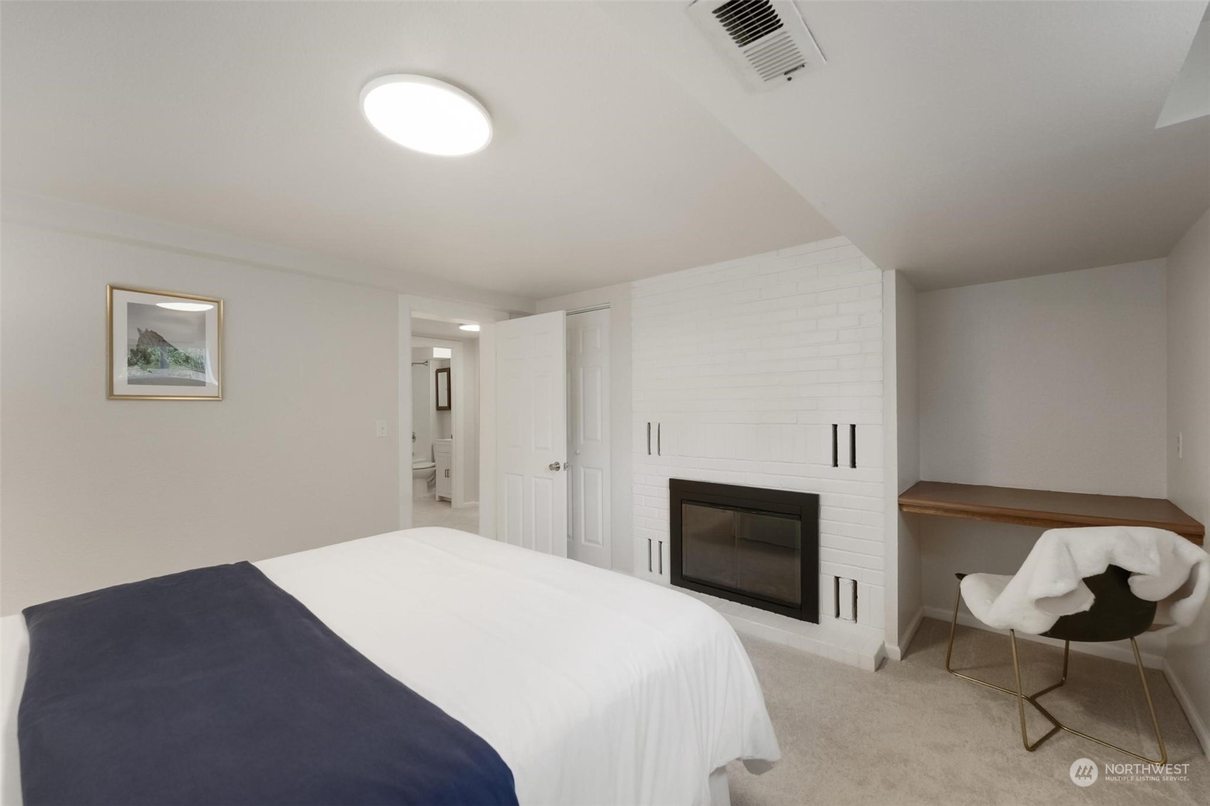 2232 South 330th Street Federal Way, WA 98003 - Photo 34 of 39 a bedroom with a bed and chair