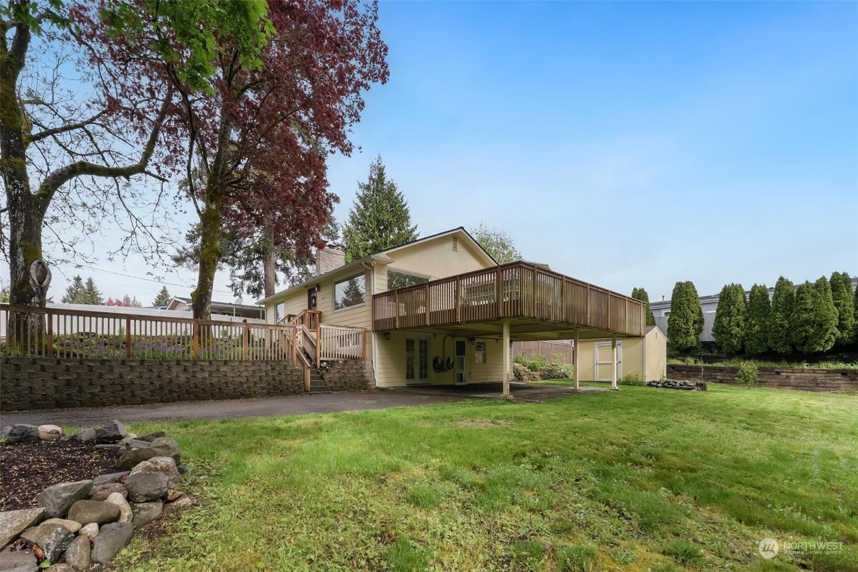 2232 South 330th Street Federal Way, WA 98003 - Photo 37 of 39 a view of a house with a yard