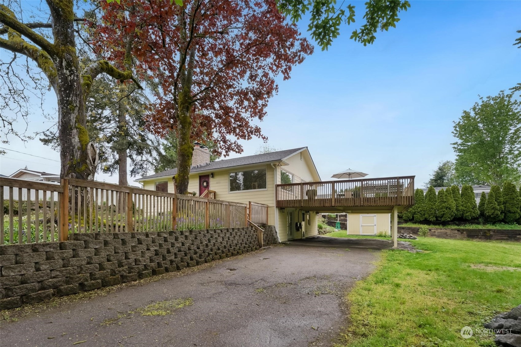 2232 South 330th Street Federal Way, WA 98003 - Photo 39 of 39 a view of a house with a yard and plants