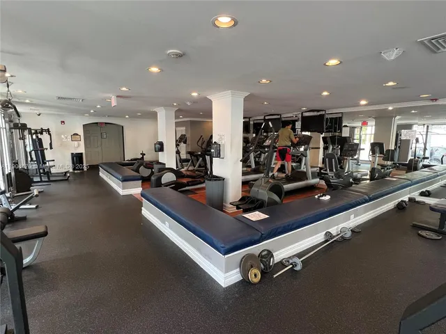 a view of a room with gym equipment