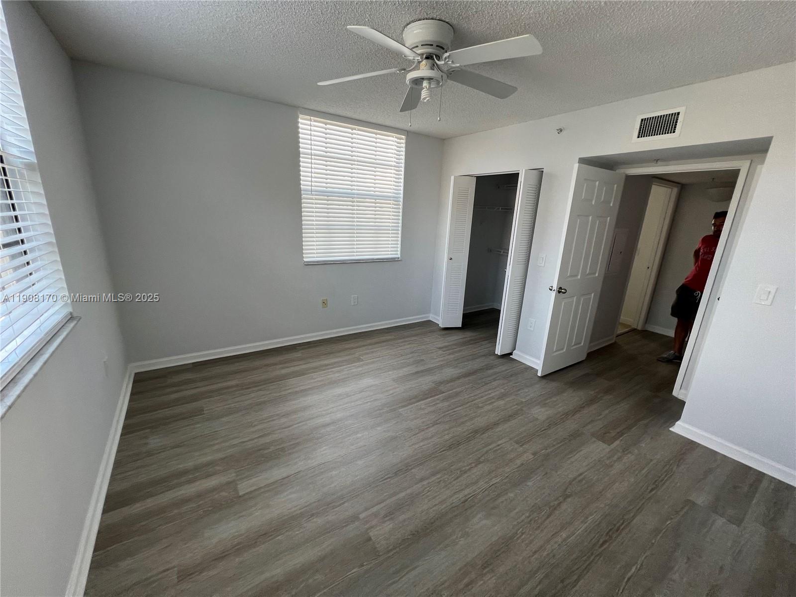 1919 Van Buren Street, Unit 720A Hollywood, FL 33020 - Photo 21 of 22 wooden floor in an empty room with a window