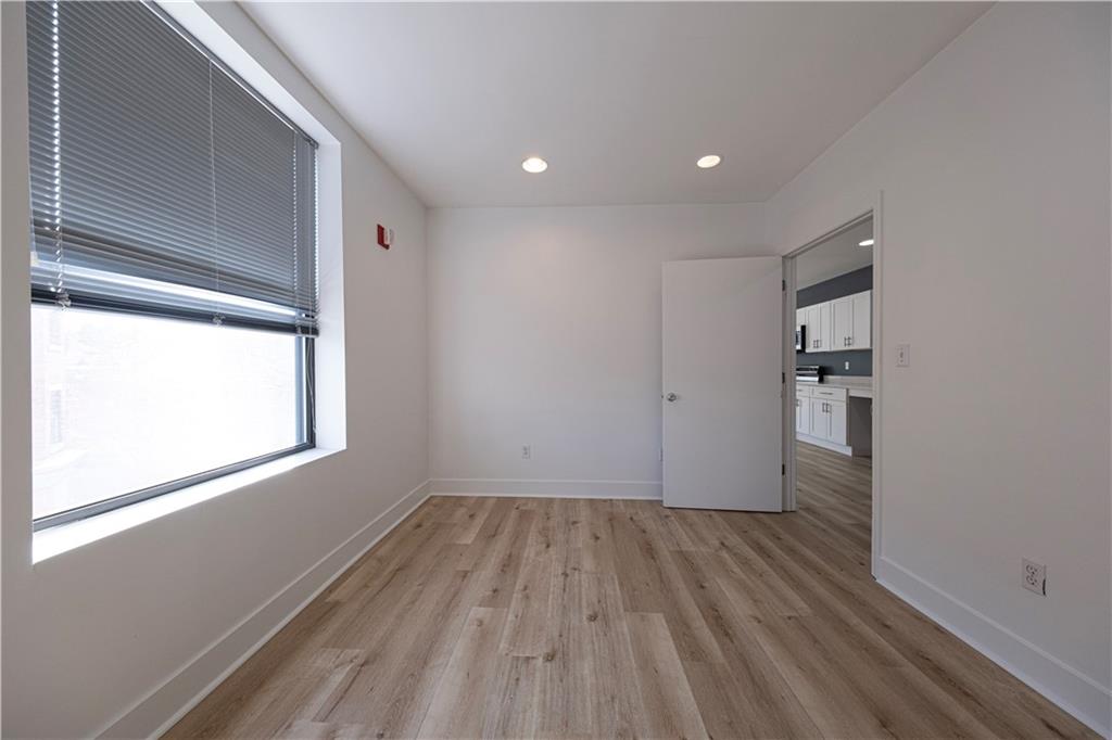 232 3rd Avenue, Unit 3 Carnegie, PA 15106 - Photo 17 of 21 a view of empty room with wooden floor and fan