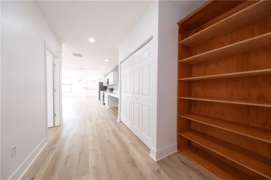 232 3rd Avenue, Unit 3 Carnegie, PA 15106 - Photo 19 of 21 a view of a hallway with wooden floor and staircase