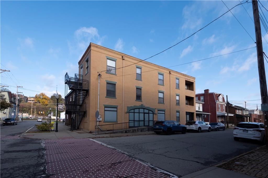 232 3rd Avenue, Unit 3 Carnegie, PA 15106 - Photo 4 of 21 a city street lined with tall buildings