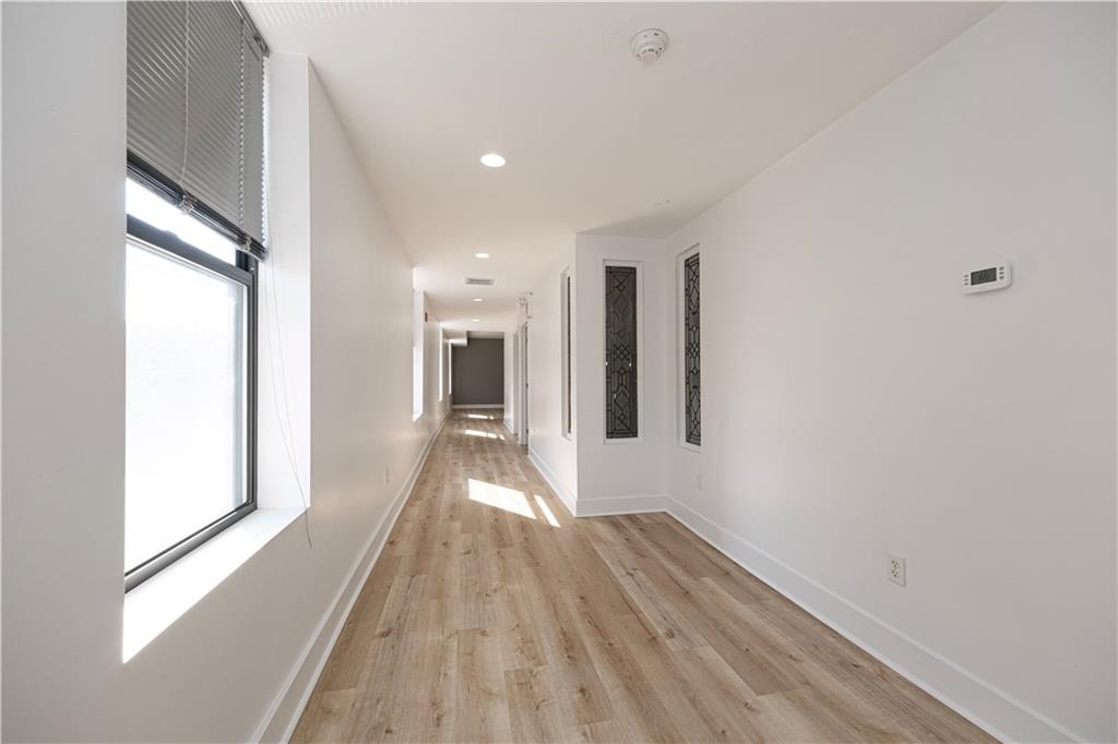 232 3rd Avenue, Unit 3 Carnegie, PA 15106 - Photo 9 of 21 a view of a hallway with wooden floor