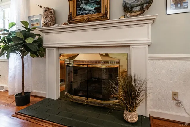 a stove top oven sitting inside of a kitchen