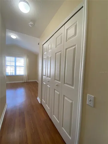 a view of entryway with wooden floor