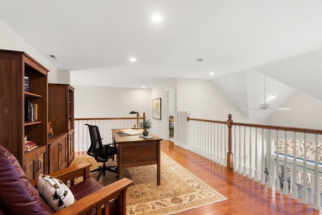 25 South Cottage Road, Unit 25 Belmont, MA 02478 - Photo 17 of 29 a workspace with furniture and a rug