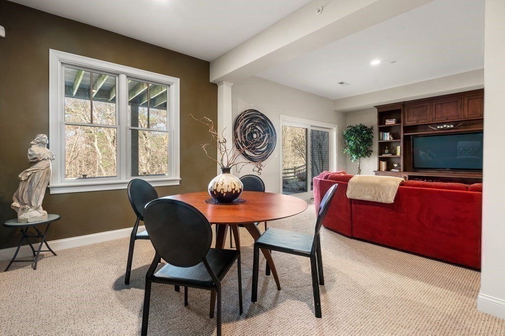 25 South Cottage Road, Unit 25 Belmont, MA 02478 - Photo 21 of 29 a view of a dining room with furniture window and outside view