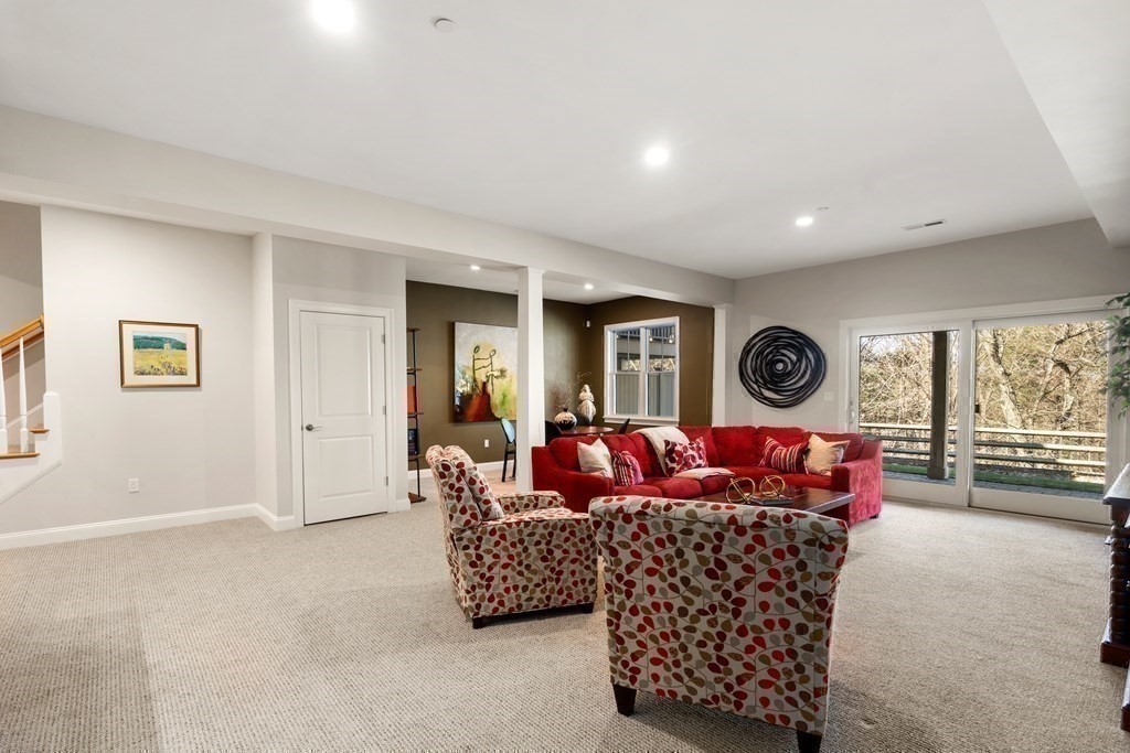 25 South Cottage Road, Unit 25 Belmont, MA 02478 - Photo 24 of 29 a living room with furniture and a window