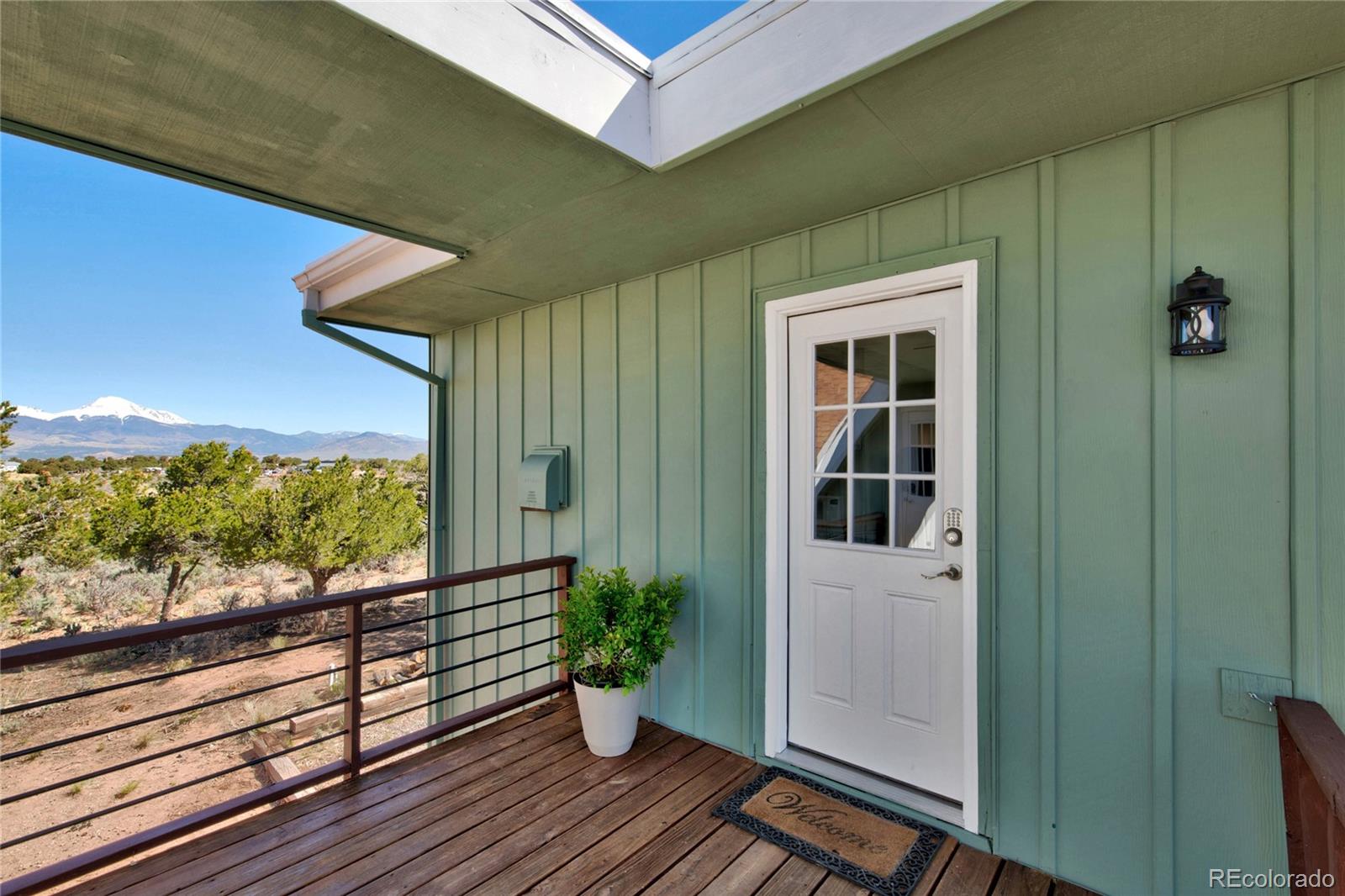 6949 Debutts Road Fort Garland, CO 81133 - Photo 34 of 48 a view of a balcony with potted plants