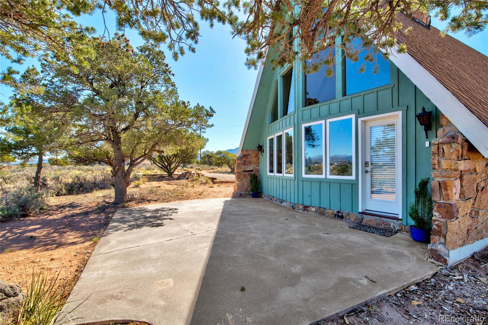6949 Debutts Road Fort Garland, CO 81133 - Photo 44 of 48 a view of a house with a yard