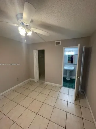 a view of a livingroom with a staircase
