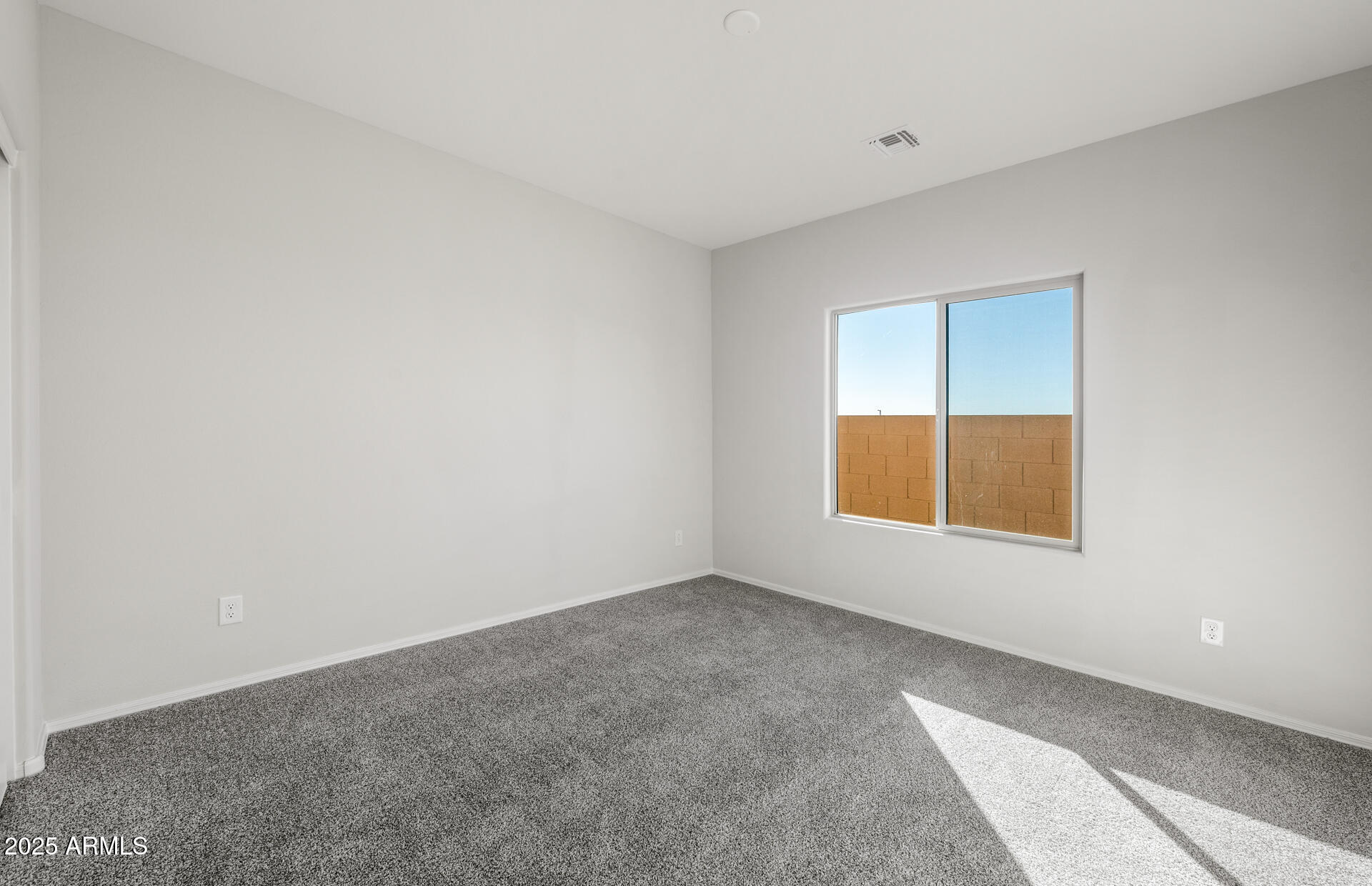 6795 West Ripken Way Florence, AZ 85132 - Photo 26 of 35 an empty room with windows