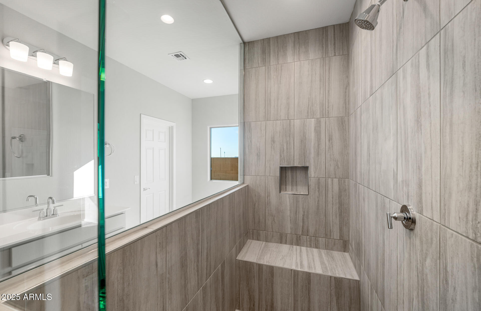 6795 West Ripken Way Florence, AZ 85132 - Photo 33 of 35 a bathroom with a sink and mirror