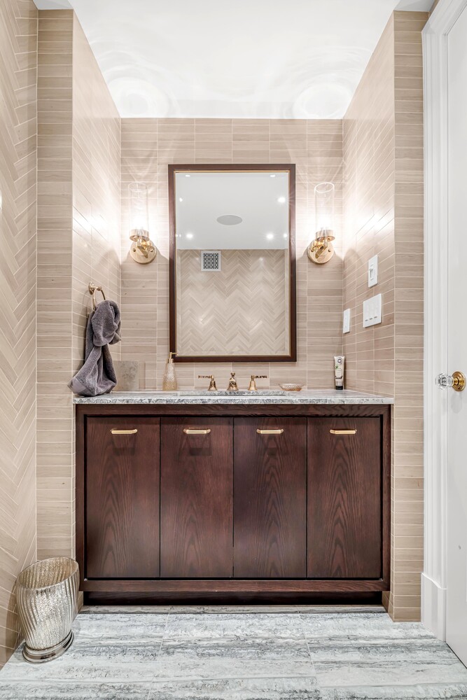 785 Park Avenue, Unit 13DE Manhattan, NY 10021 - Photo 11 of 15 a bathroom with a sink and a mirror