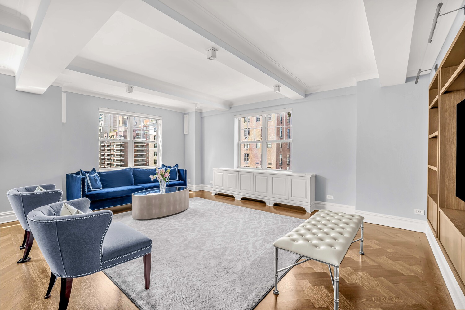 785 Park Avenue, Unit 13DE Manhattan, NY 10021 - Photo 3 of 15 a living room with furniture and a window